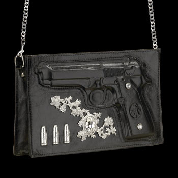 With embossed leather 'Beretta' pistol, decorated with two Swarovski crystals. Chrome - plated metal 'foliage' encircling a spectacular Swarovski crystal and adjacent branded bullets. Including a metal chain strap. Approx. dimensions: 24.5cm (9") wide X 16cm (6") high X 5cm (2") deep. 